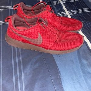 Red/burgundy Nike Roshe